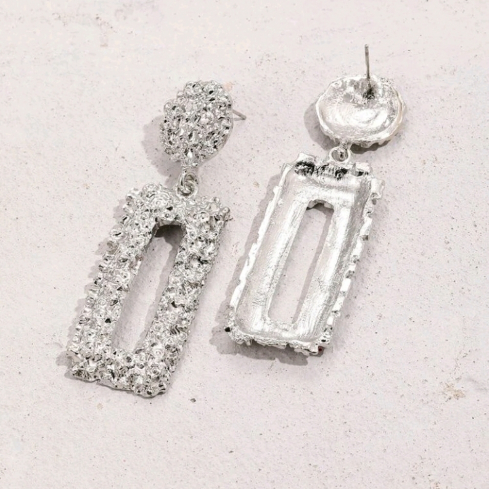 Silver Textured Metal Earrings - Picture 2 of 3